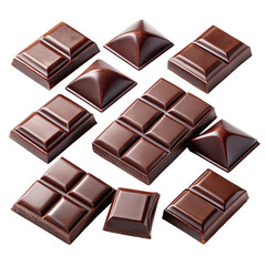 A collection of black chocolate squares showcases various shapes and sizes on a smooth blank backdrop creating an inviting and elegant appearance