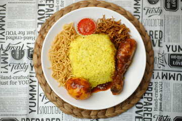 Golden Turmeric Rice Plate A Delicious Indonesian Culinary Delight