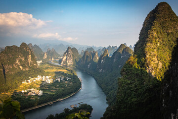 beautiful karst landscape of yangshuo, china, river li, bending river, sunset, hills, view from...