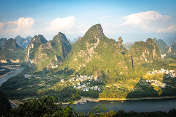beautiful karst landscape of yangshuo, china, river li, bending river, sunset, hills, view from...