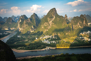 beautiful karst landscape of yangshuo, china, river li, bending river, sunset, hills, view from...