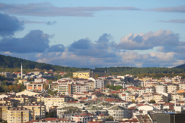 Aerial View of a Scenic City with Mountains in the Background