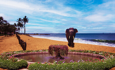 The Scenic Beach View with an Elephant Fountain amid Lush Greenery is breathtaking for all