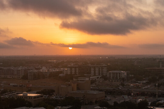 The Sun rises over Austin, Texas, USA during a dangerous Summer heat wave that has been straining the power grid and causing brownouts and electrical shortages on the ERCOT power grid 