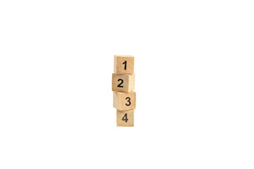 Stacked wooden blocks with numbers from 1 to 4 isolated on white background