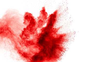 A red cloud of powder is blowing in the wind with white background.
