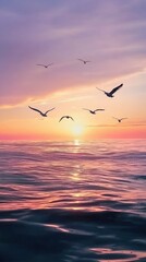 Serene Sunset Over Ocean with Seagulls Flying in Twilight Sky