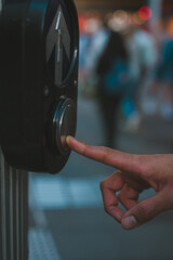 Push button at pedestrian crossing crosswalk street road