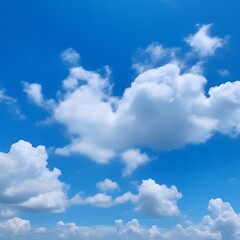 Vivid blue sky filled with fluffy white cumulus clouds