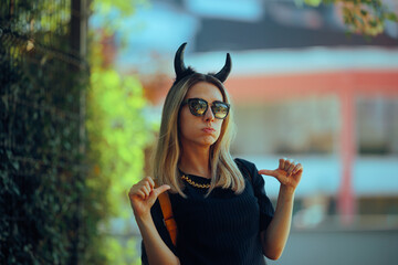 Selfish Devilish Woman Pointing to Herself being Obnoxious . Evil mean girl being self-obsessed...
