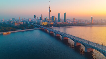 Fototapeta premium Sunrise cityscape bridge river traffic aerial view.