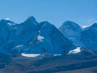 Beautiful high altitude hanging glacier and snow capped mountain in Tibet, China