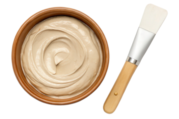 Facial mask in bowl with spatula isolated with transparent background