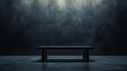 A professional studio with a dark grey backdrop, a polished table, and evenly distributed black and white lighting for product photography