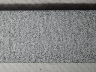 Fototapeta premium A grey and white striped surface with a lot of texture