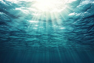 Obraz premium Ocean water surface concept. Sunlight filtering through tranquil ocean water.