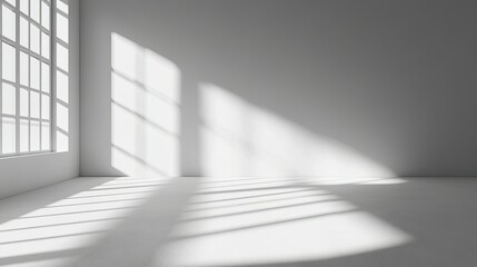 Fototapeta premium Minimalist interior featuring sunlight streaming through a light channel, casting subtle shadows on a white cement wall background.