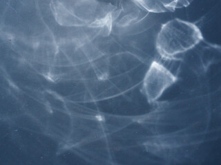 Reflection from glass, winter morning sunlight for abstract background.