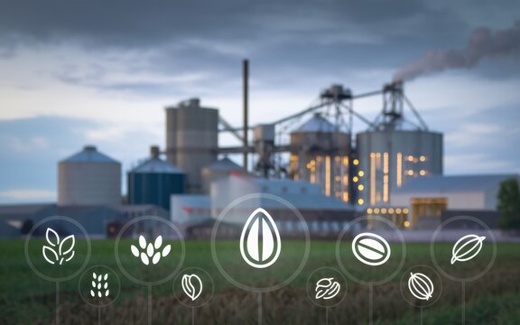 Grain processing plant with various crop icons displayed