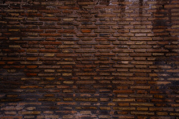 Ancient red brick wall showcasing history and craftsmanship. Timeless structure, full of character and charm, with every brick telling a story of the past. A true architectural wonder.