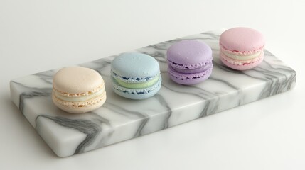 Obraz premium A luxurious arrangement of delicate macarons in pastel hues, including mint and lavender, styled on polished marble