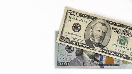 Fifty and hundred-dollar bills arranged on a white background, symbolizing financial stability, wealth, investment, and cash flow. Ideal for banking, business, and financial services promotions.