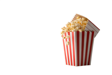 Popcorn flying out of red white striped paper box isolated on white, transparent background, PNG