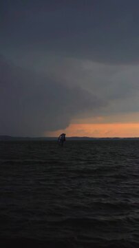 Wing foil rider riding in the lake