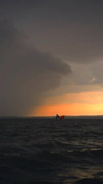 Wing foil rider riding in the lake
