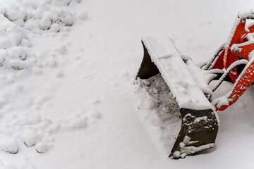 Snow-covered machinery and tracks in Oslo