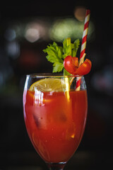 bloody mary with strow a tomatoes