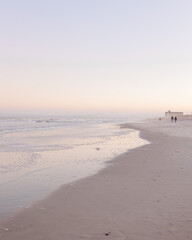 dusk at the beach with pastel skies