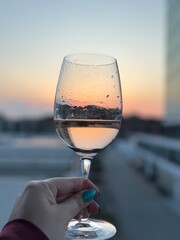 Sunset Reflections in a glass of rose wine