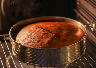 Freshly made homemade cake in the domestic oven