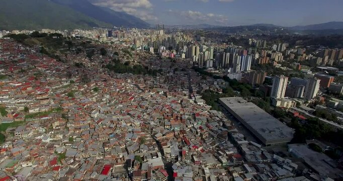 Drone shot of the slums in the city of Caracas the capital of Venezuela, on a sunny day