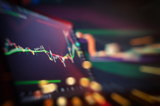 Abstract financial trading interface with dynamic stock market candlestick chart and blurry light effects