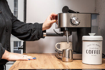 The process of making coffee at home. Coffee machine. Ground coffee.