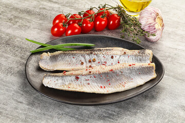 Marinated herring fillet with green onion