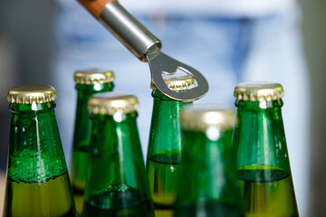 Beer bottles and metal bottle opener