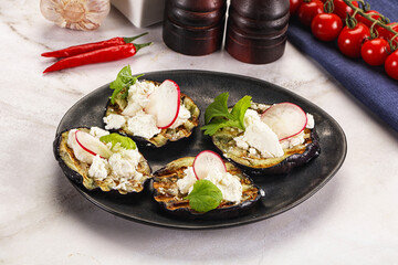 Grilled eggplant with cheese and radish