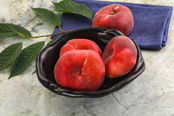 Ripe sweet and juicy Flat peach
