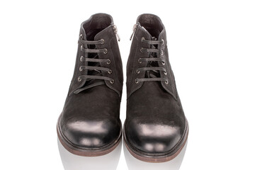 Men's winter boots, close-up, isolated on a white background and top view.