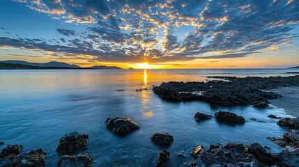 Gentle Sunrise with Faint Clouds