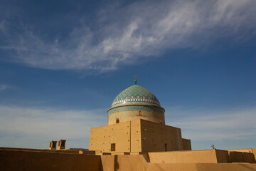 Dome of Roknoddin mausoleum in Yazd, Iran with details of ornamental tile work. 
