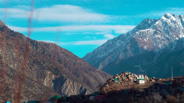 Triloknath village under the snowy Himalayan mountain peak at Lahaul and Spiti district in Himachal Pradesh, India. Beautiful village under the snowy Himalayan mountain peaks during the winter season.