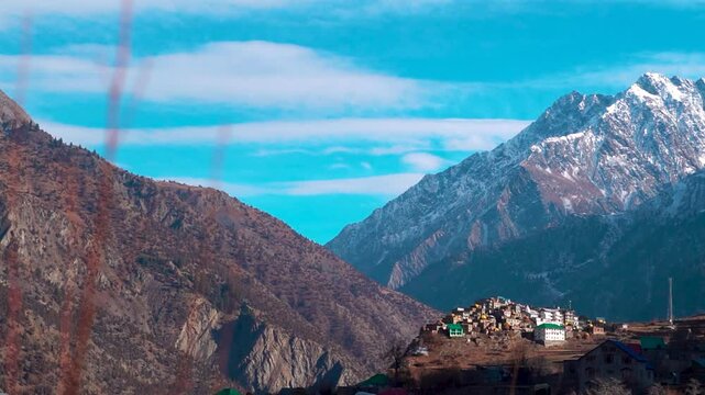 Triloknath village under the snowy Himalayan mountain peak at Lahaul and Spiti district in Himachal Pradesh, India. Beautiful village under the snowy Himalayan mountain peaks during the winter season.