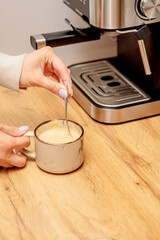 The process of making coffee at home. Coffee machine. Ground coffee.