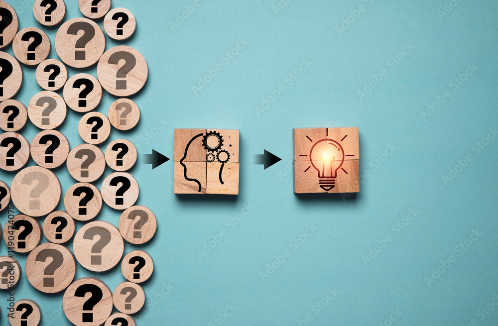Poster question mark on wooden cube block with human thinking and glowing light bulb , creative thinking id