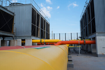 Cooling tower and pipe for air condition System (HVAC) in Factory. Cooling tower for air...