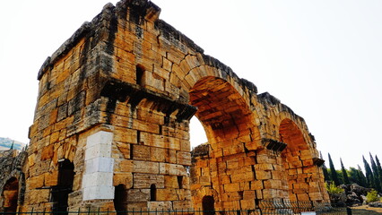 Arch Ancient Wide-Angle Sunlit Golden Stone Historical Structure Outdoor